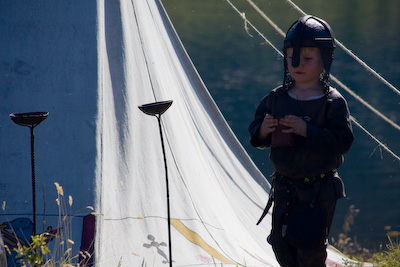 Viking boy in leather helmet