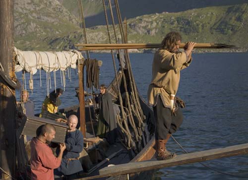 Unloading the ship from the port side.