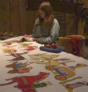 Viking embroidery based upon the Osberg tapestry