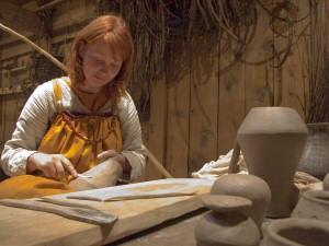 Jana Kruse working the clay to recreate a Tating ware pitcher